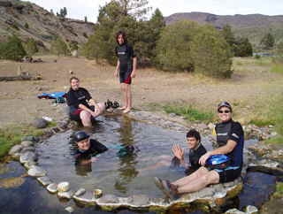 Kayakers from our vacation rentals stop at the hot spring half way point on the North fork of the Carson River for a soak