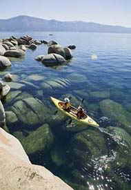 kayaking at south lake tahoe directly across  from  Lake Village Vacation Rentals