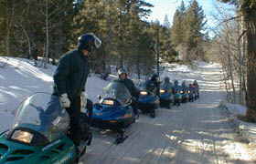 Along the trail there is always a straggler.   Here the  group from Lake Village 's Accommodation Tahoe waits on a straggler.