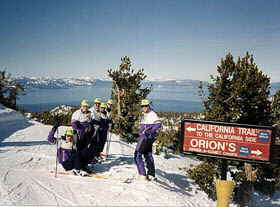A group of Accommodation Tahoe guests enjoy a sunny day Heavenly Valley Skiing